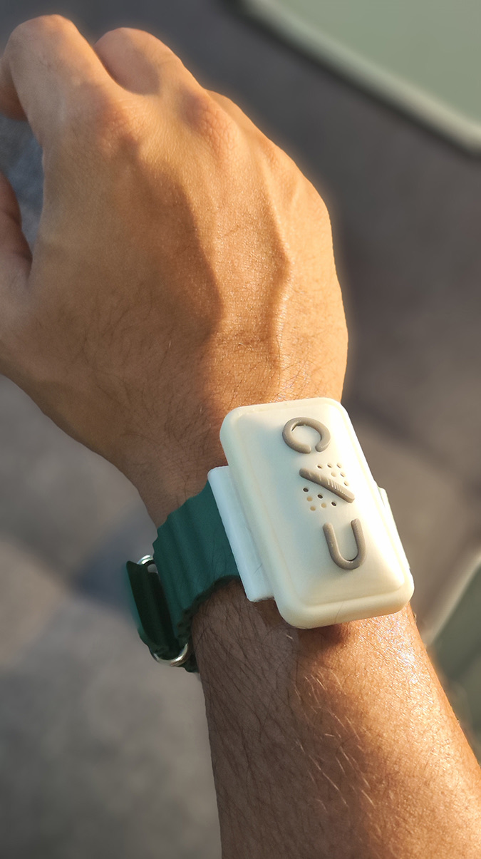 The ONU form study worn on a wrist strap outdoors